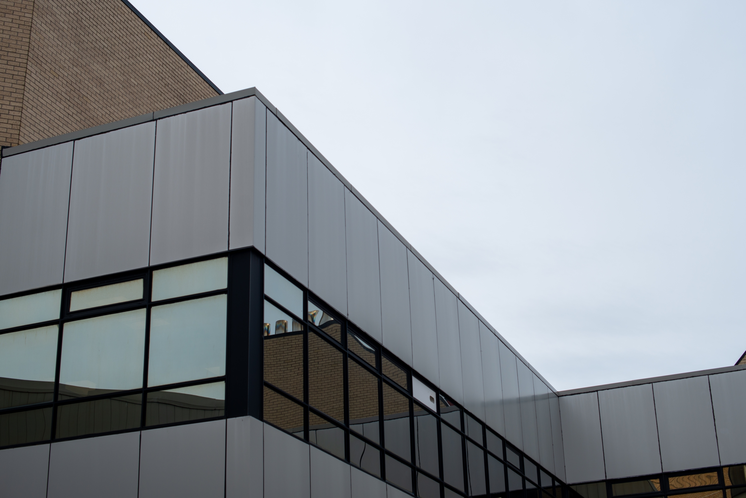 The,Exterior,Wall,Of,A,Contemporary,Commercial,Style,Building,With The,Exterior,Wall,Of,A,Contemporary,Commercial,Style,Building,With